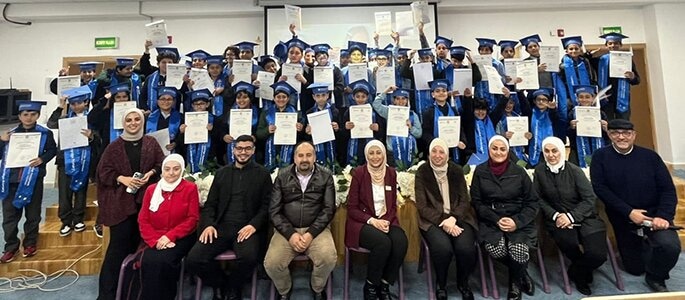 Group of students with certificates