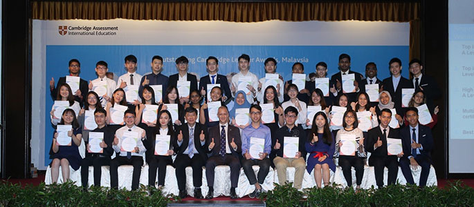 Malaysian students with their award certificates
