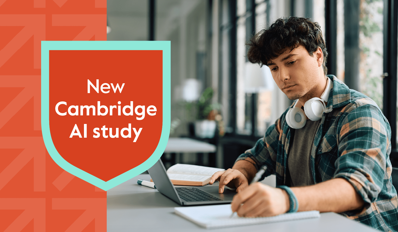 A man taking notes from his laptop