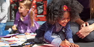 Children with coloring materials