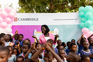 Teacher celebrating her win with her students
