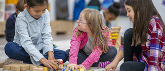 Children playing with toy blocks