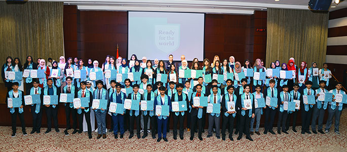 A group of award winners holding certificates