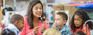 Teacher and children in a science lab