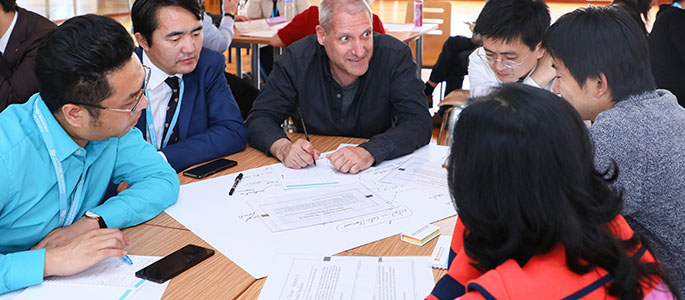 Delegates doing a paper exercise