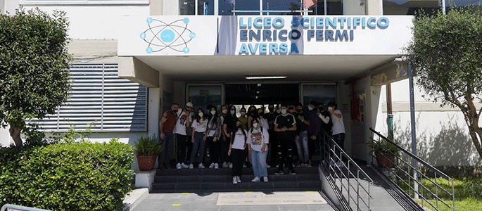 Students standing outside a school building